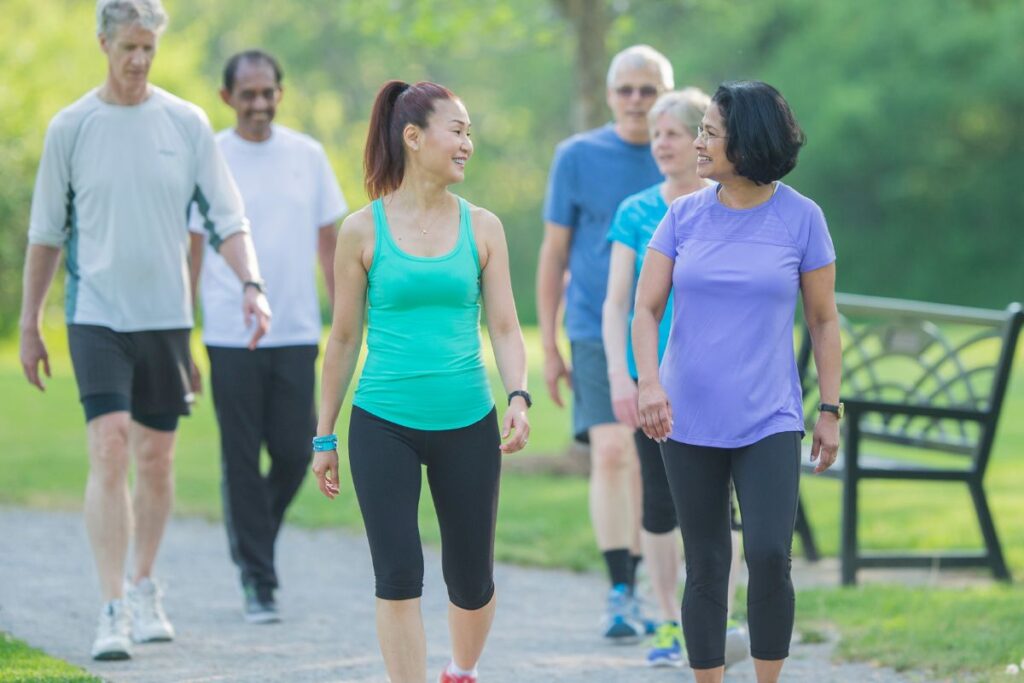 A group of six employees go on a walk together