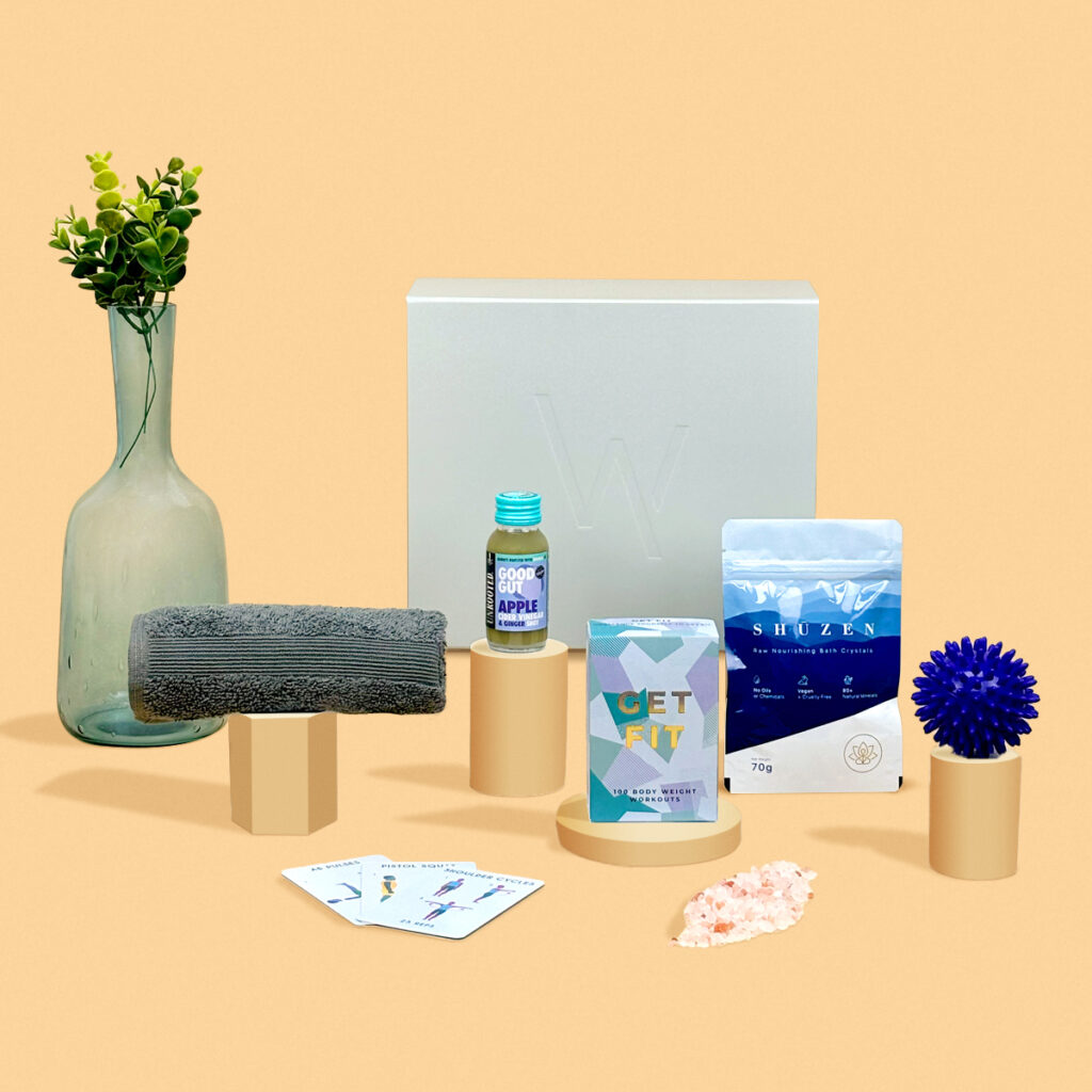 an image of our International Men's Day gift which includes a luxury town, Get Fit cards, a health shot, bath salts and a massage ball. 