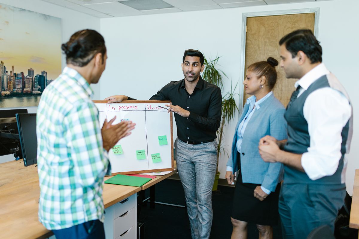 A sales team take part in a meeting