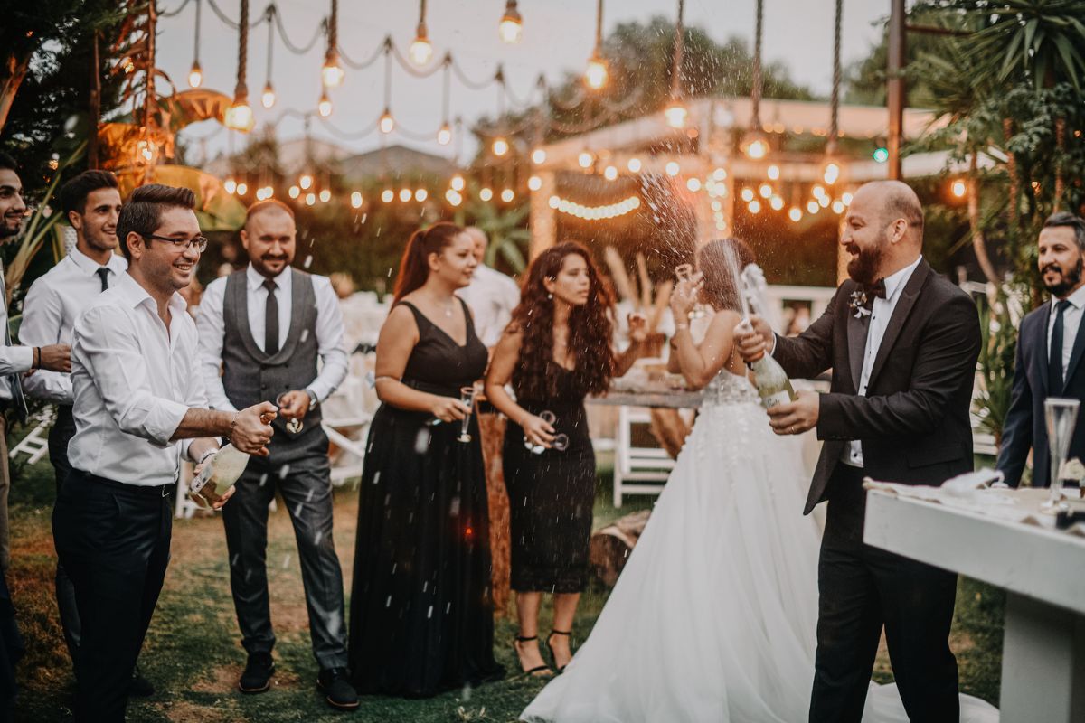 A couple celebrate their wedding with friends and family