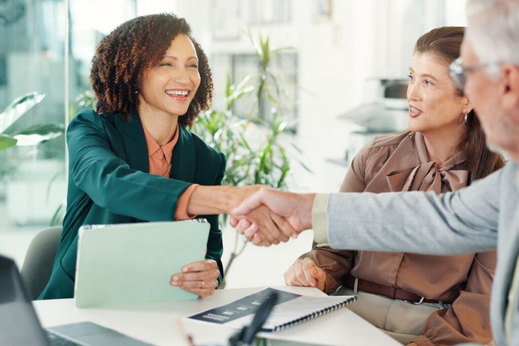 A client shakes hands 