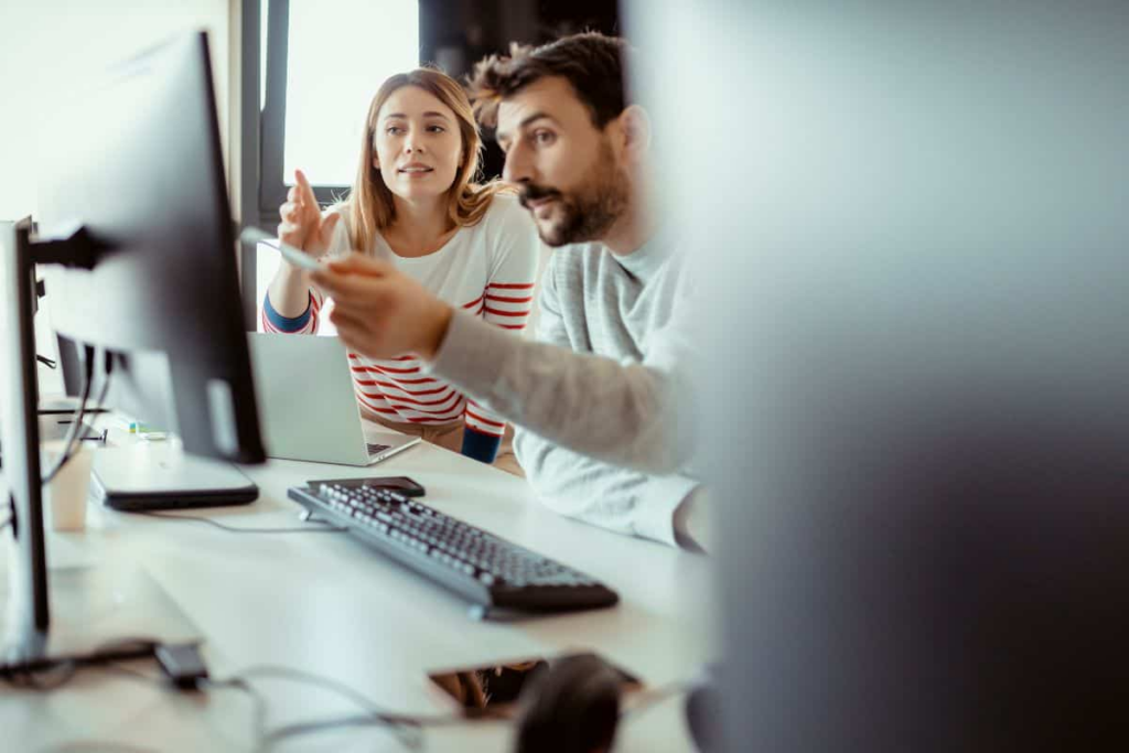 A team collaborate together in a meeting at a bcorp