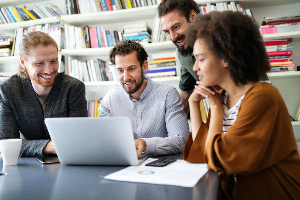 A team working together in a meeting at a bcorp